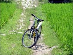 Country roads in Yangshuo may get muddy and slippe