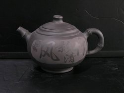 A Tea Pot Made by the Wooden-Fish Stone