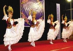 Dancers in Muslin Corban Festival in Xinjiang