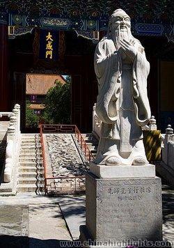The stone statue of Confucius in front of Beijing Confucius Mansion