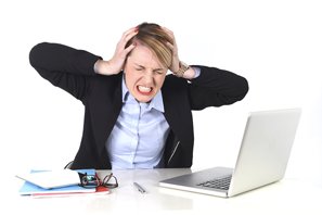 Grimacing Woman with Laptop