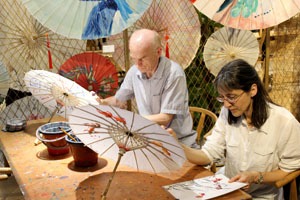 Painting on a paper umbrella