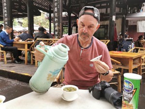 Traveler is experiencing tea culture in People's Park in Chengdu.