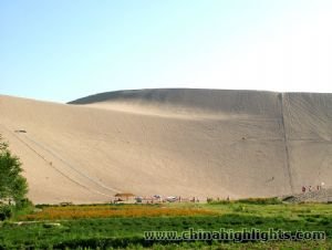 A small oasis in the desert,Singing Sand Mountain A small oasis in the desert,Singing Sand Mountain