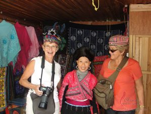 Western tourists with Red Yao woman in Longji