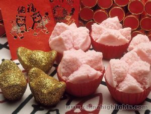 Chinese New Year food includes Chinese Dumplings, Fish, Spring Rolls and Nian Gao. Chinese New Year food includes Chinese Dumplings, Fish, Spring Rolls and Nian Gao.
