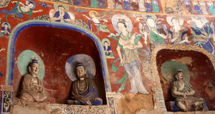 the colorful Buddhas and murals