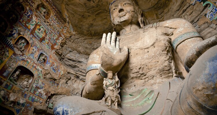 Maitreya Buddha and strongman figure