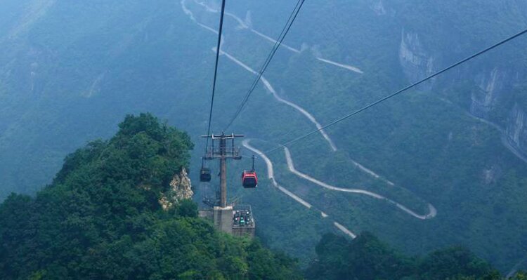 Tianmen Mountain and its cable car amidst blue tones