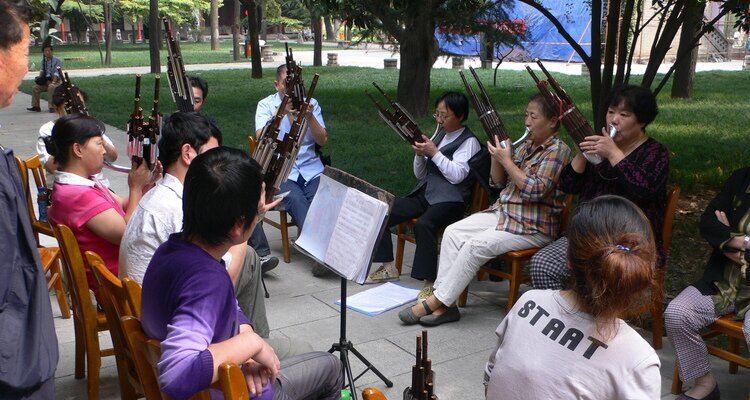 Locals playing musical instruments