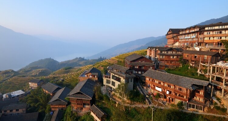 Guilin Longsheng Ping'an Rice Terraces and Zhuang Villages bathed in the rising sun
