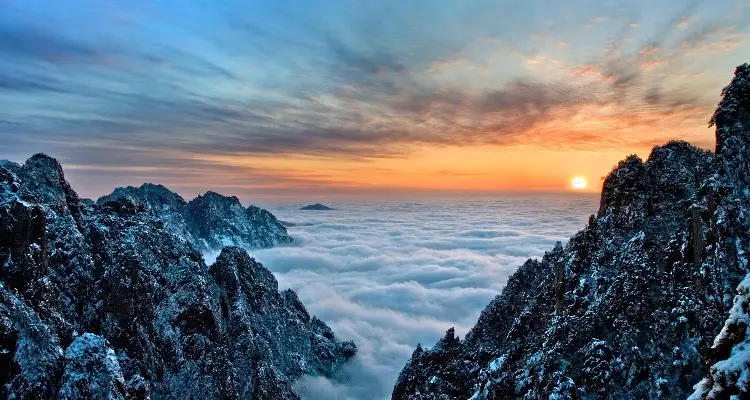 the yellow mountain in snow, seas of clouds