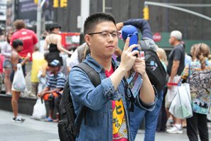 Asian man using smartphone