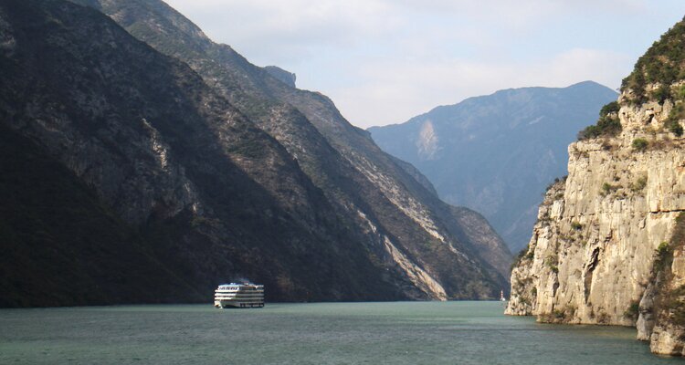Admire the majestic gorge sight while taking a Yangtze River cruise