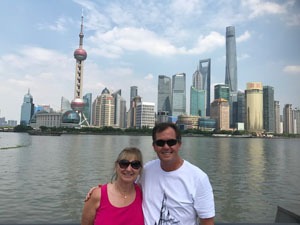 China Highlights clients and the Shanghai skyline at the Bund