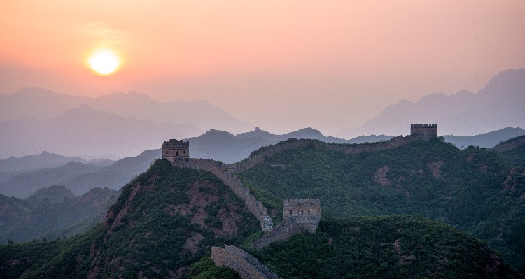 the stunning view of sunset over the Great Wall