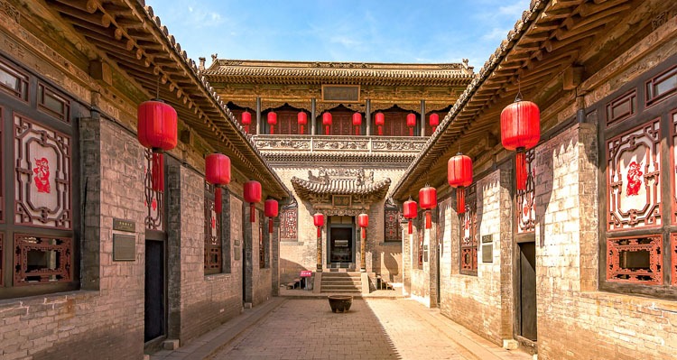 the courtyard with the red lanterns