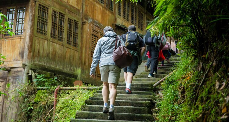 Our clients are hiking from Ping'an Village to Ancient Zhuang Village with well-packed bags