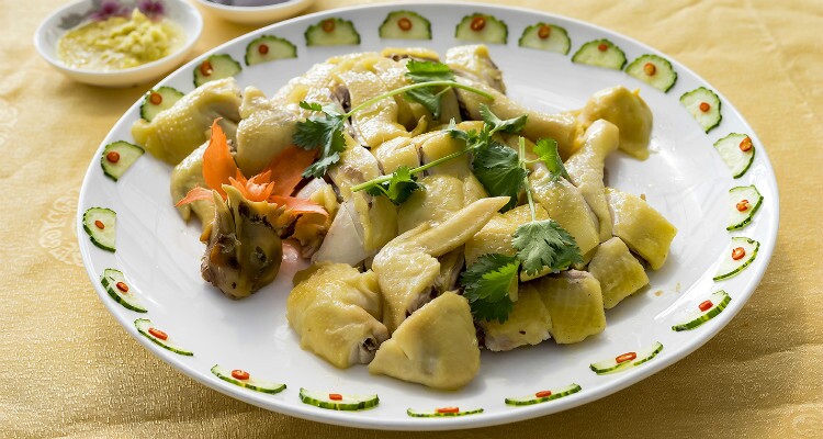 White-cut chicken (baiqie ji), prepared simply by boiling, is an example of a light but delicious Cantonese main course.