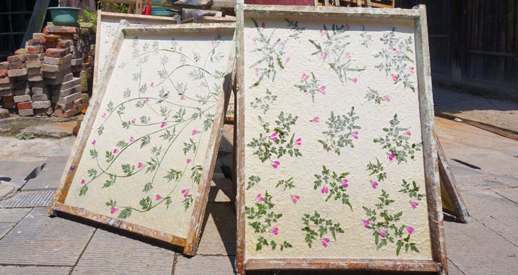 hand-made paper with flowers and leaves