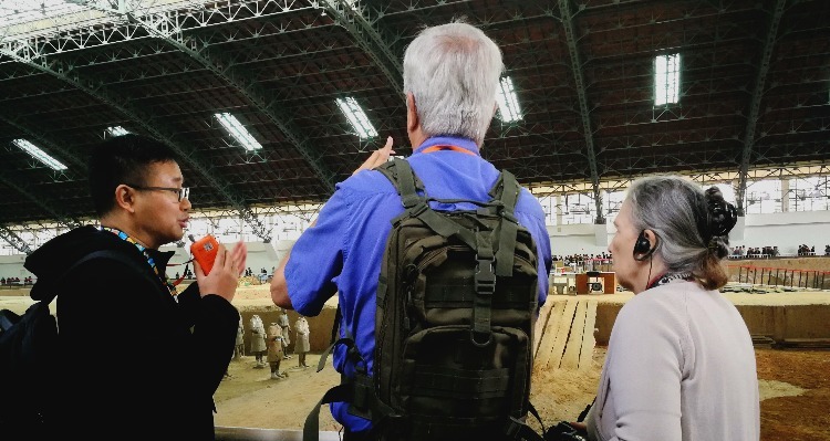 tour guide and travelers