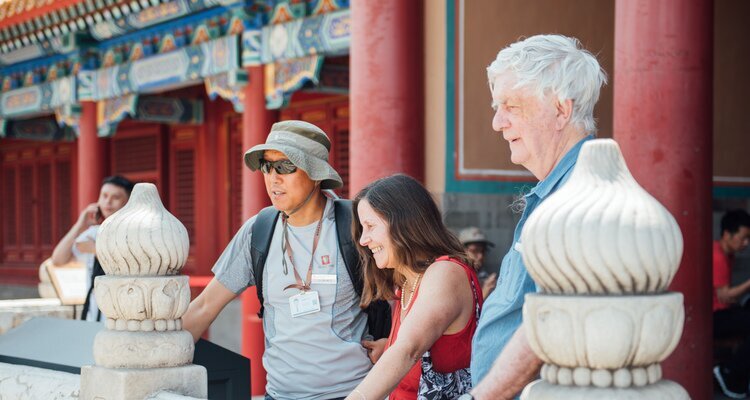 Our guide explained the Forbidden City to the guests