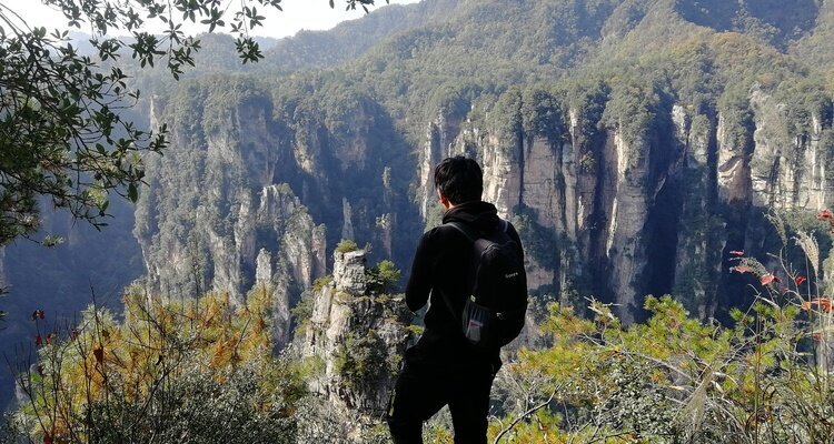 One of our guests took a break during a hike through Yuanjiajie, enjoying the scenery as he rested.