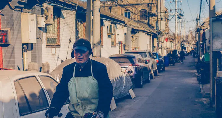 a local man on the bike in hutong