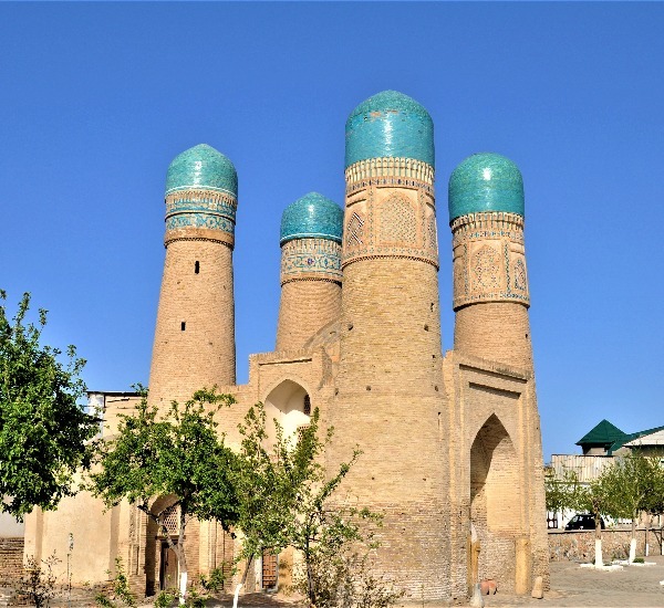 4 towers with blue tops