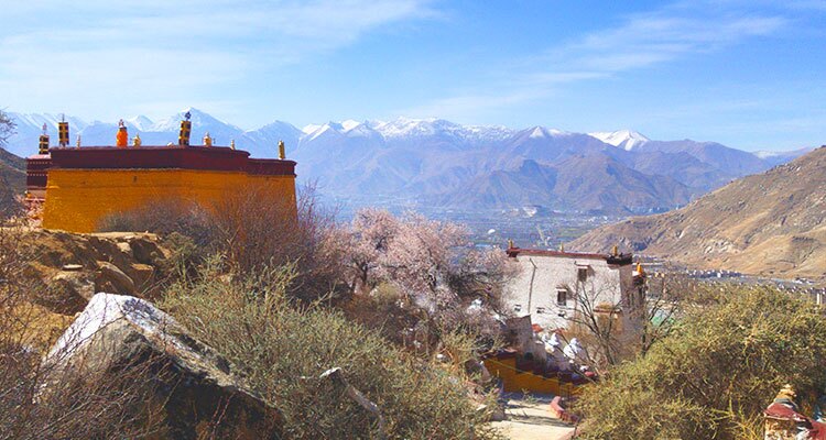 yellow monastery on the mountain