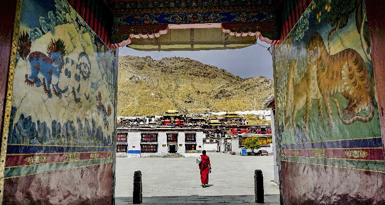 A Lama walking in the monastery