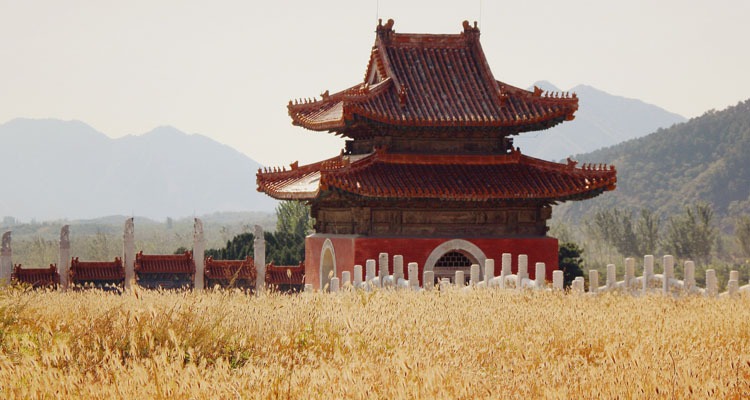 A red pavilion with the reeds growing around