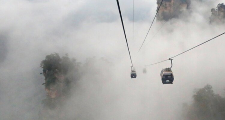Take a cable car through the clouds to peak Tianmen Mountain