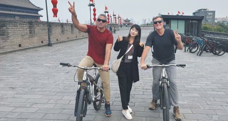 Our guests cycling around the City Wall with our guide