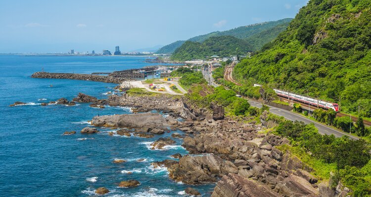 the lush mountains bordering the Pacific Ocean in Yilan