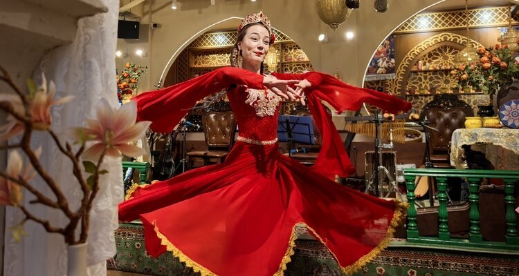 a dancing lady with a red dress