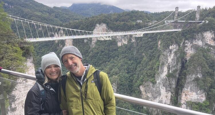 A Lovely Couple Took a Selfie In Front of the Grand Canyon Glass Bridge
