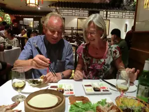 Eating Chinese food in a local restaurant